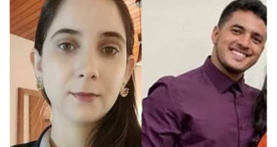 a man and woman smiling and posing for a photo