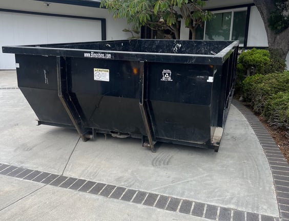 Our 11 cubic yard dumpster getting ready to be filled with household junk.  