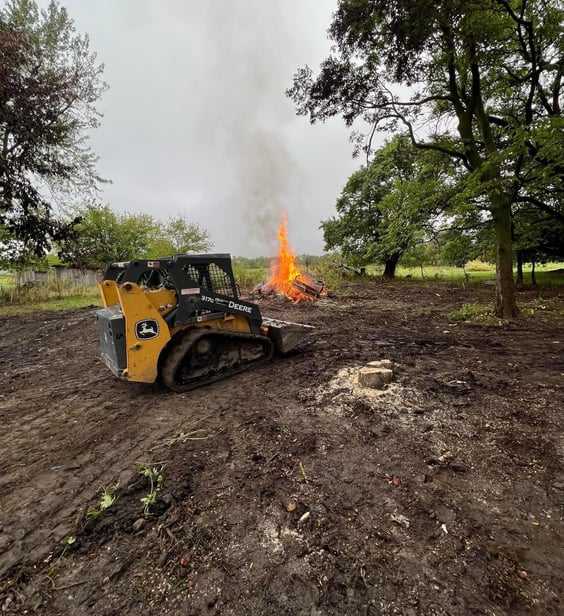 skid-steer-clearing-land-in-hannibal-mo