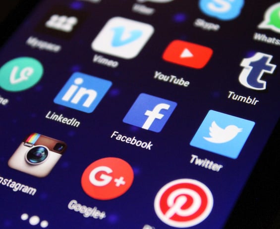 a cell phone with a bunch of social media icons