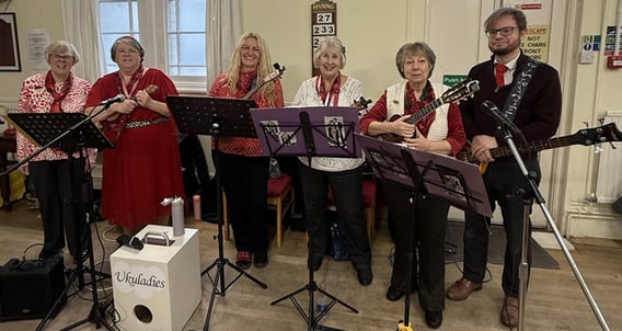 Ukuladies playing at Christmas time with our guest bassist