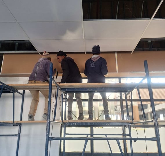 Supervising Bulkhead installation for suspended ceiling, Belair Shopping Centre