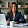 a woman in a suit and a cup of coffee