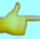 a hand holding a banana peeler in front of a blue sky
