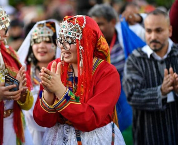 a group of people in traditional costumes and costumes