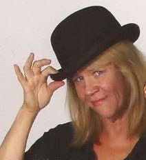 a woman in a black top hat and a black top hat
