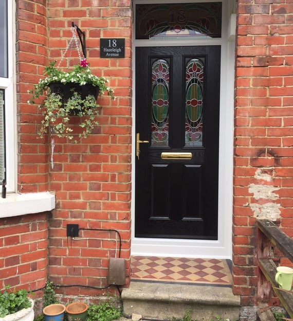 new black front door with bespoke glass which was fitted in Woolston, Southampton by Buildmydoor