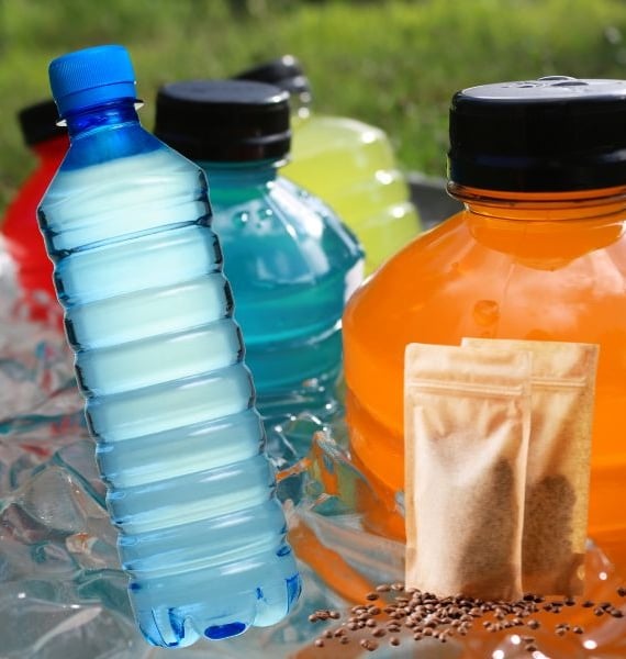 a variety of different colored bottles of water and energy drinks