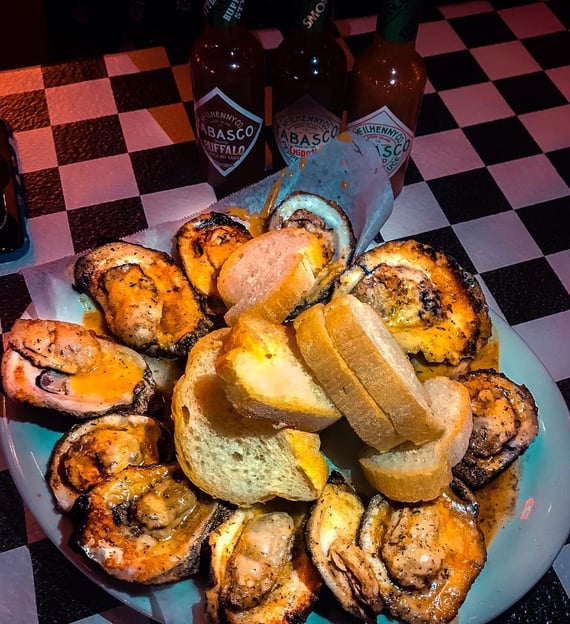 Acme Oyster House oysters on a plate