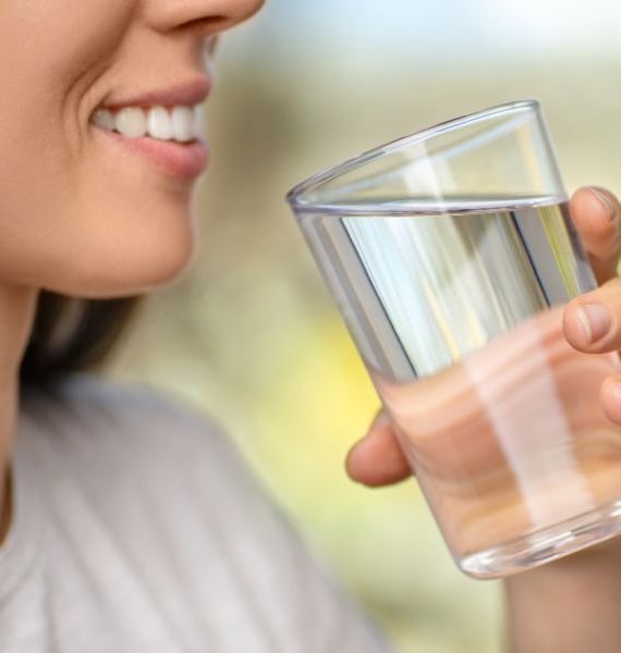 woman on diet drinking water