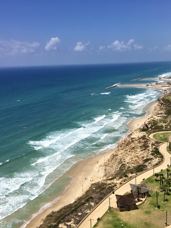 a beach with a view of the sea
