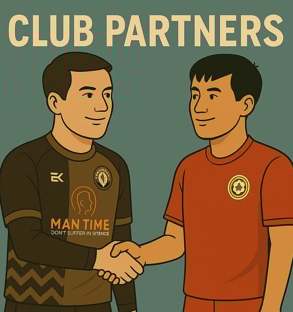 a man shaking hands with a man in a red shirt