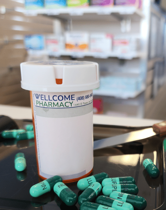 Wellcome Pharmacy prescription vial