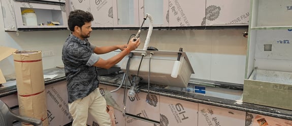 Multifunctional kitchen sink installation by plumbing expert