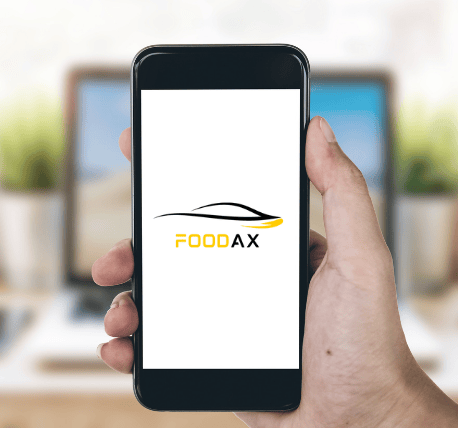 a person holding a phone with a logo on it