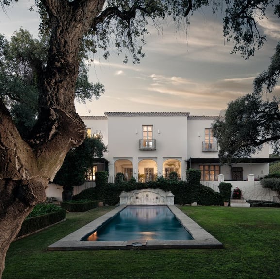 Finca Santa Katerina pool and facade seen at sunset