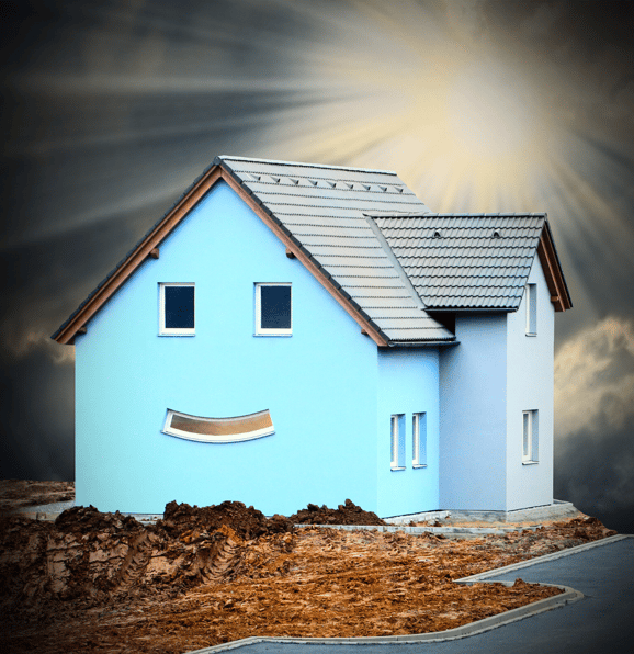 a house with a smiley face on the front of it