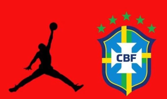 a man jumping up to a basketball ball