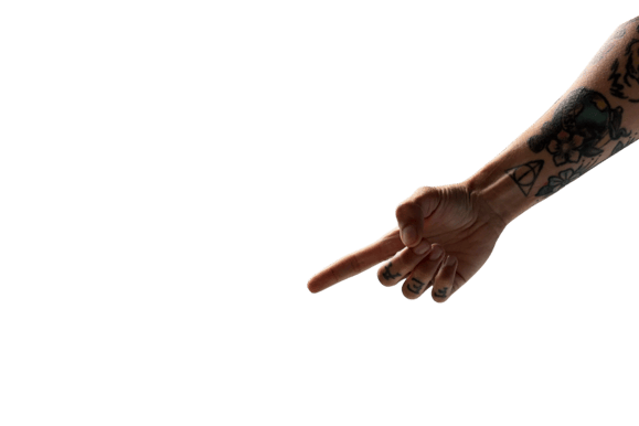 tattoed arm of a woman pointing to the CTA button
