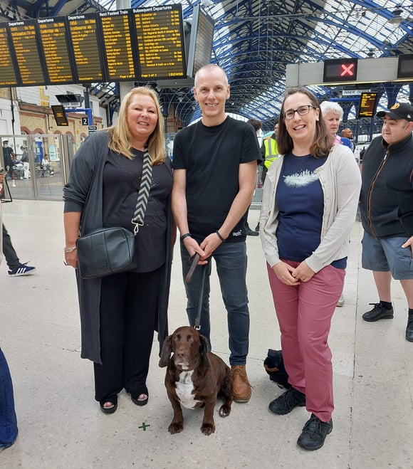 Helen Spooner with her family and dog Henry at Brighton Station for The Piano on Channel 4
