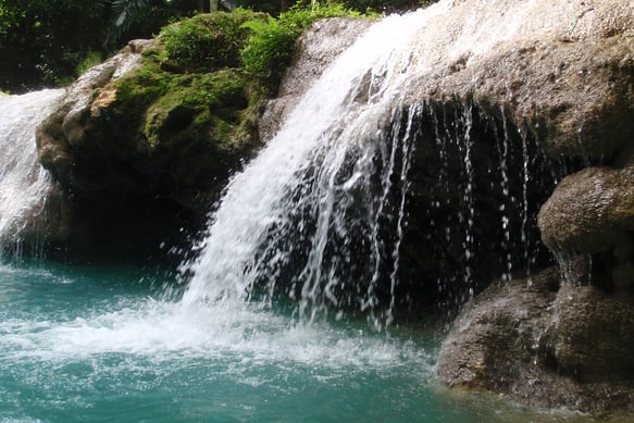 A beautiful secret waterfall discovered by one of our clients while hiking in the Jamaican jungle