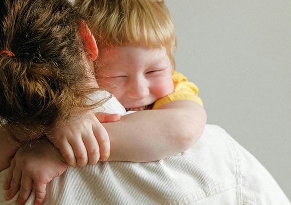 mother holding son