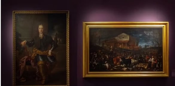 a man in a suit and a woman in a suit and a man in a