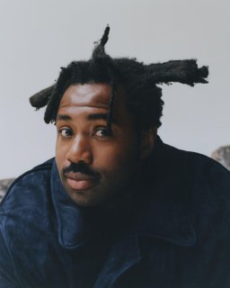 a man with dreadlocks and dreadlocks on his head