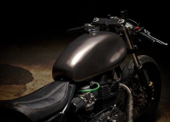 A unique resin tank and a hand made seat with secret fender. Click image for details