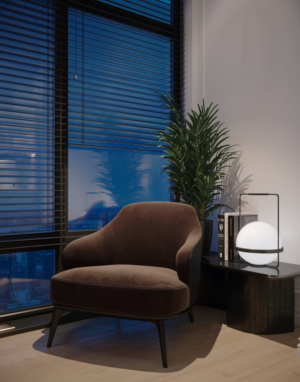 a chair with a side table and a lamp on it