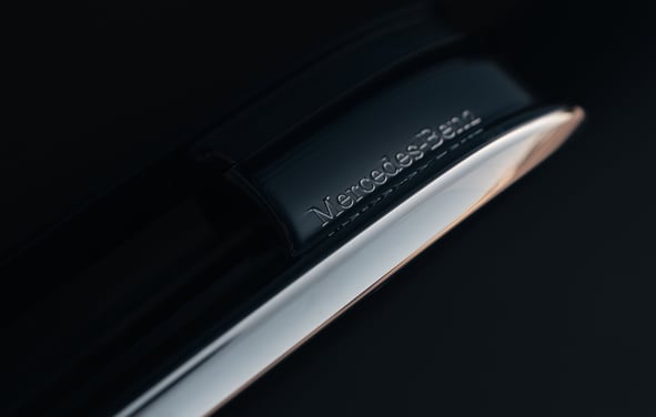 a close up of a mercedes benz door handle