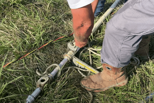man installing new pipe fittings