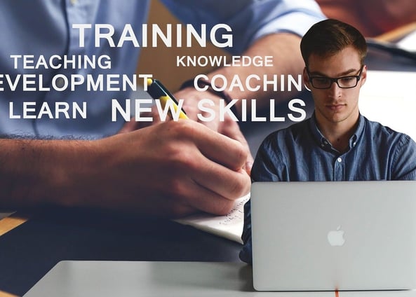 Man in front of a laptop and various training words in the background