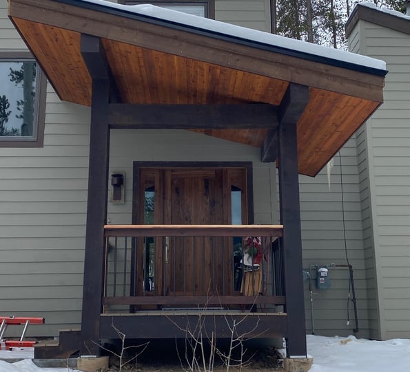A house with a wooden porch