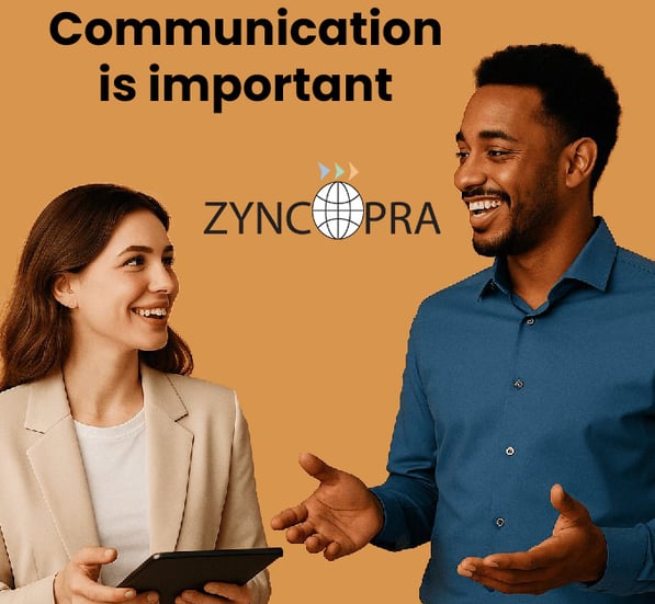 Two professionals smiling and discussing with the text ‘Communication Matters’ and Zyncopra logo..