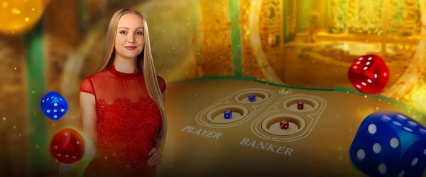 a woman in a red dress and a casino table