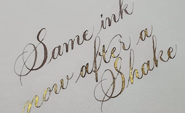Copperplate style script written in The Land of Shangri-La ink