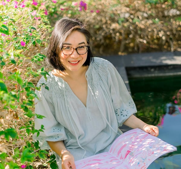 Artist Lena Sin in Bali with sketchbook