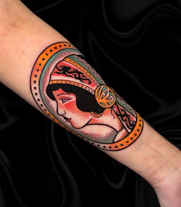 a traditional american tattoo of a woman face
