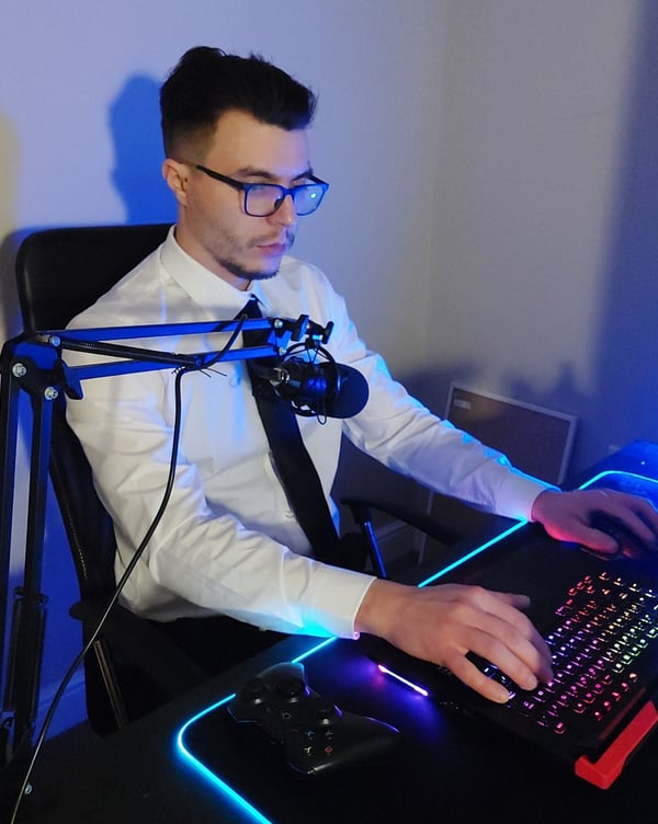 Pavel sitting at his desk working on a project