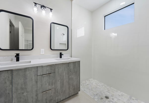 Master bathroom with dual sink, black finish faucets
