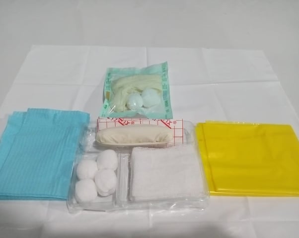 a table with a variety of different types of medical supplies
