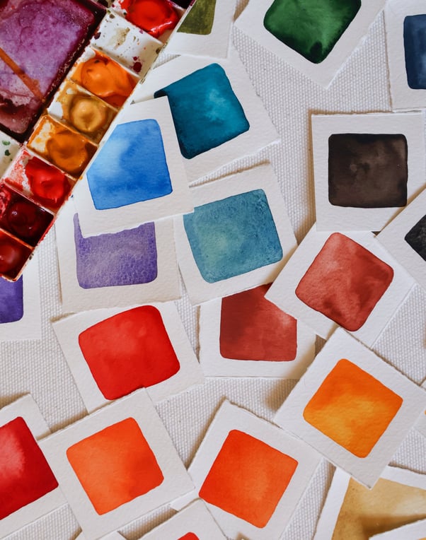 a bunch of watercolor swatches on a white background