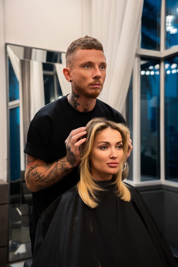 Hairstylist with client choosing style, Shines Salon, Dubai Marina | NBmore