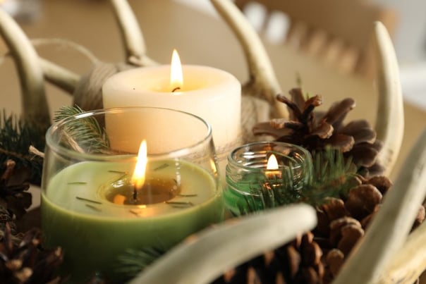 a table with candles and candles on it