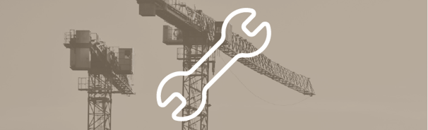Service de maintenance de grues à tour proposé par SMD Grues, représenté par une icône de clé