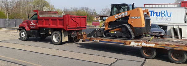moving tracked skid steer 