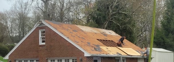 A house during a roofing job