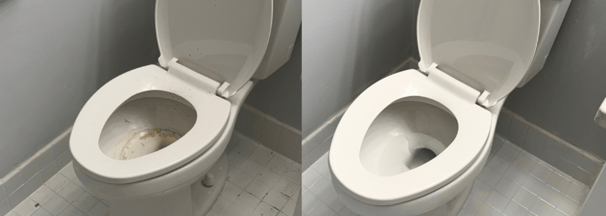a toilet with a toilet paper roll in the middle of the toilet