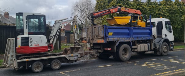 grabber and mini digger on a site in west brom